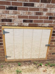 gaps around edges of crawl space door